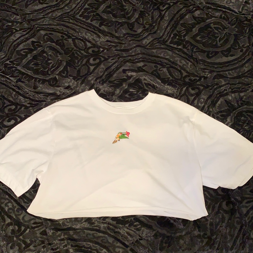 White crop top with a hummingbird in the middle